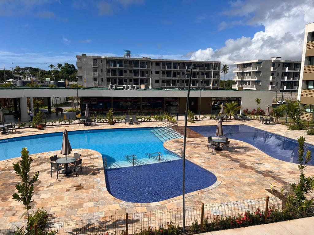 Flat Mana Beach Pono 216 na Praia de Muro alto